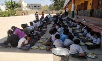 School Children having Meals